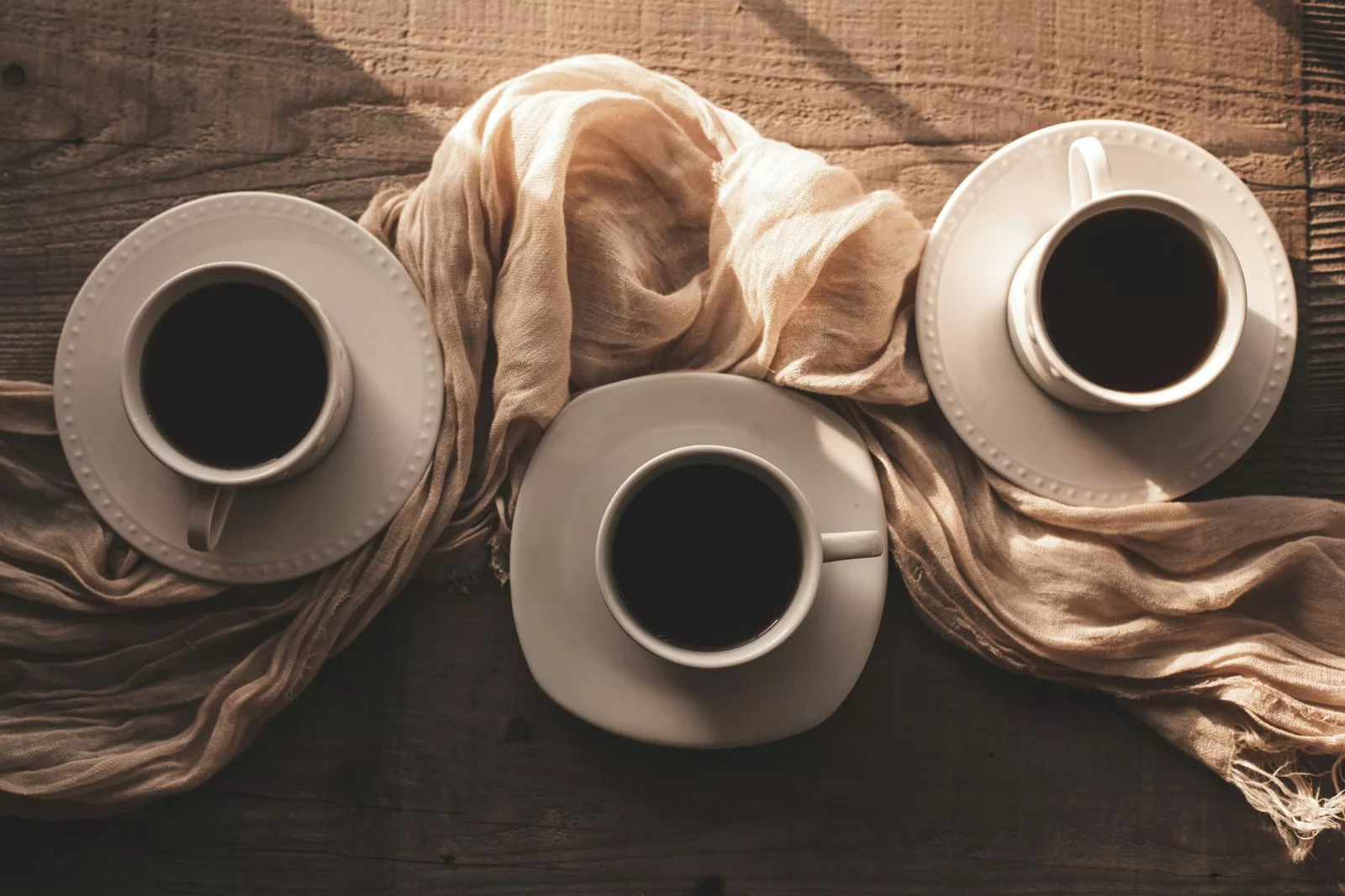 Cups of coffee on a cozy table