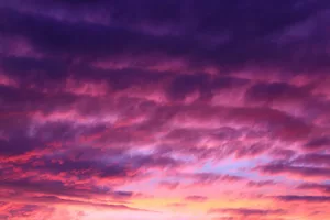 Photo of blue and red clouds