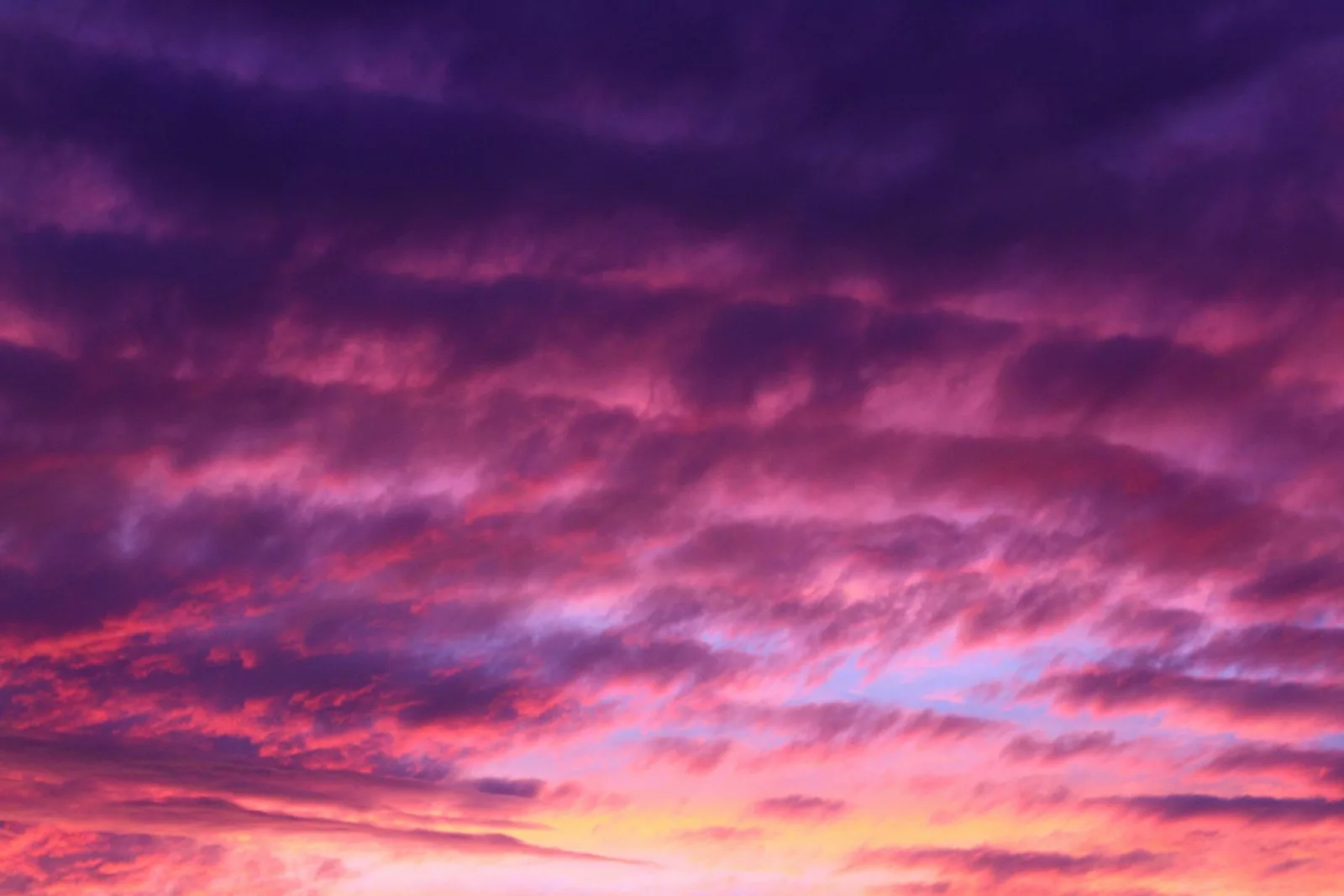 A solemn, colorful dusk sky