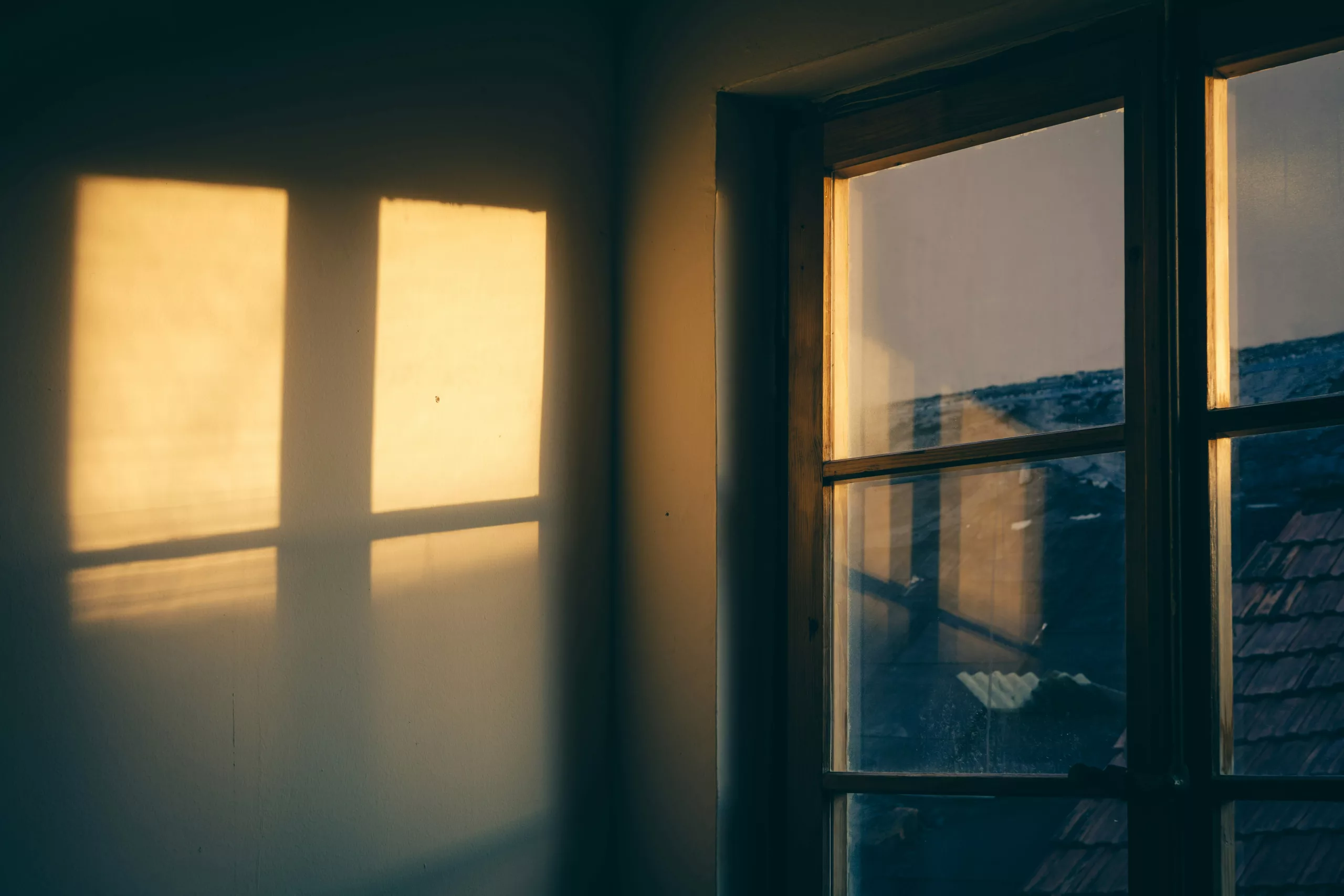 Warm sunset light coming through a window